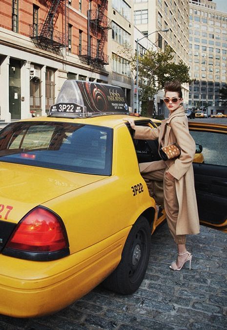 Luxury lifestyle in New York with yellow taxi and refined city setting